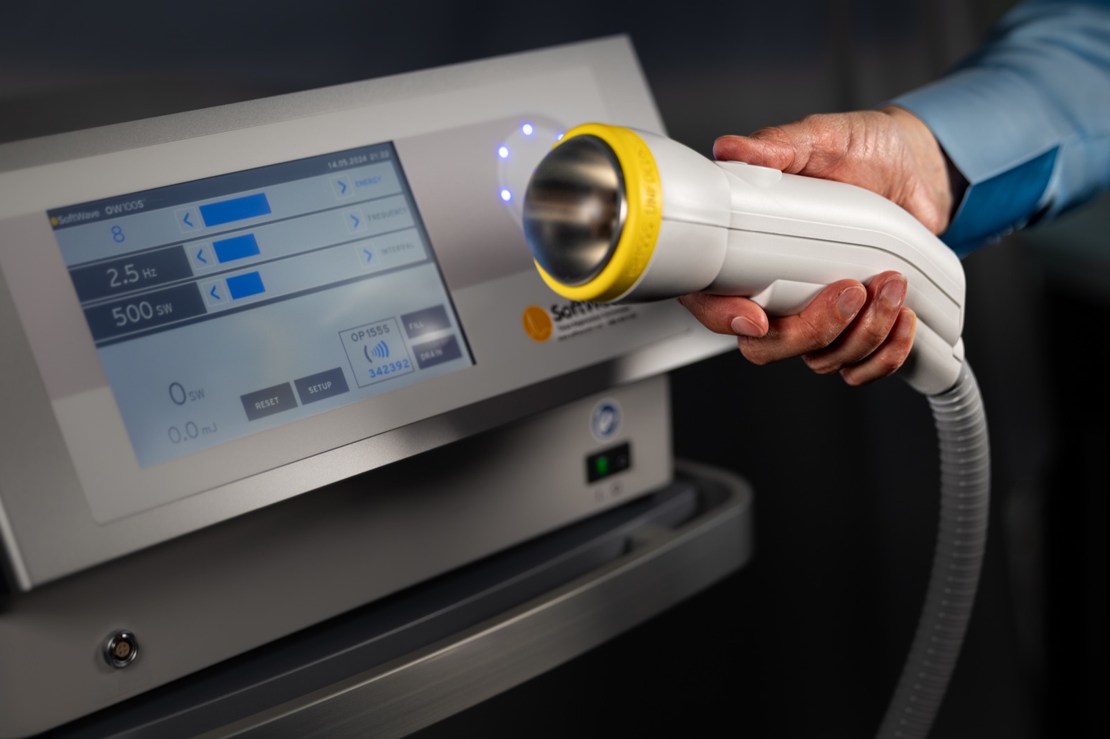 SoftWave shockwave therapy device in use at our office